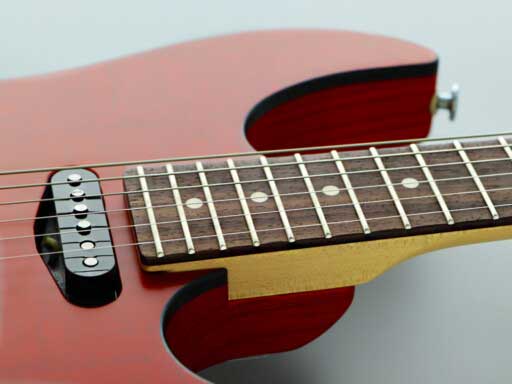 Compound radius Rosewood fingerboard with J-Standard fret edge treatment.